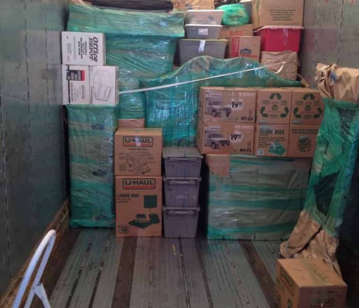 Pyramid loading and stacking a Container for cross country moving.