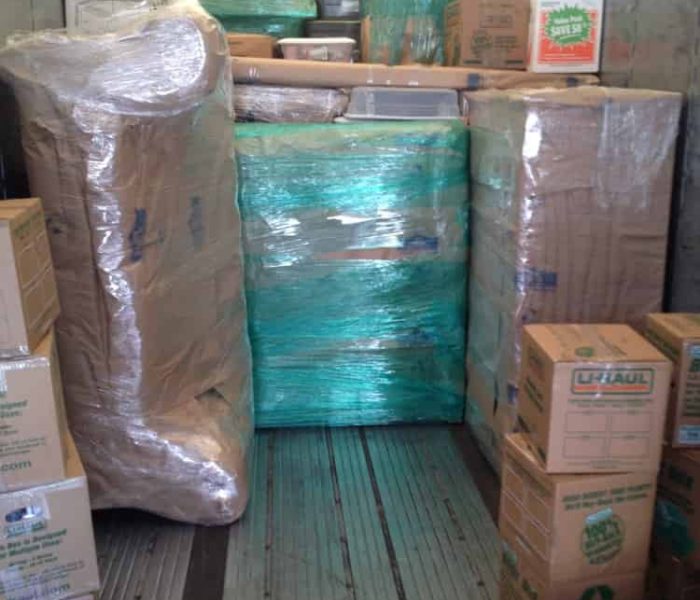 Pyramid loading and stacking a Container for cross country moving.