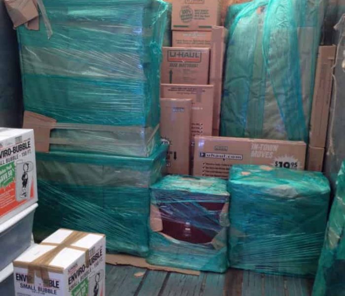 Pyramid loading and stacking a Container for cross country moving.
