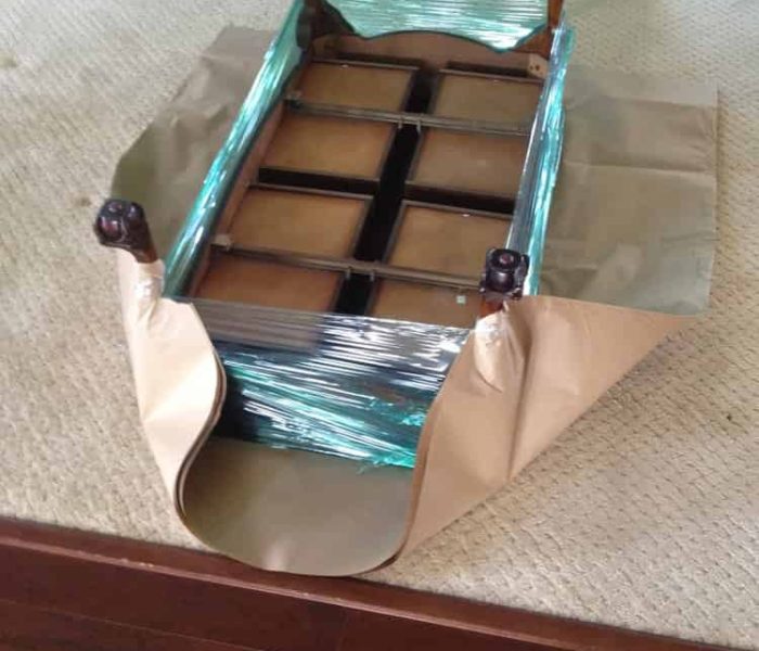 Coffee table getting paper padded.