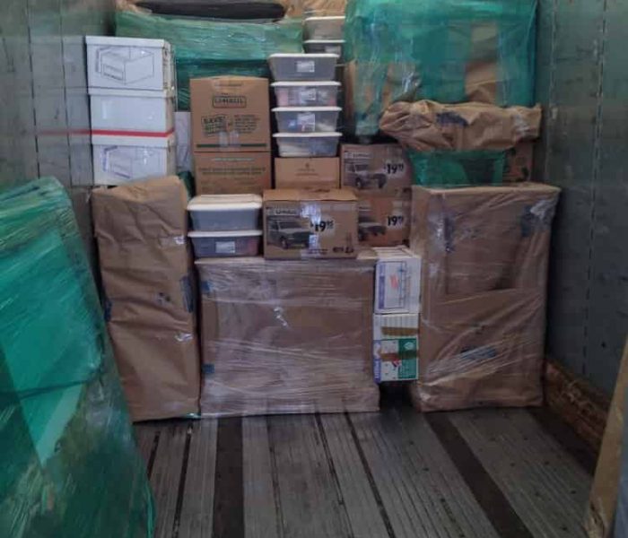 Pyramid loading and stacking a Container for cross country moving.