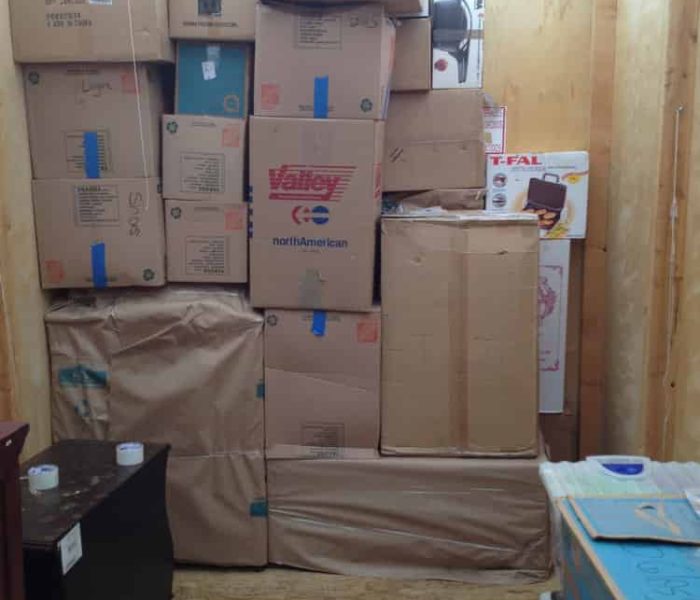 Pyramid Movers loading and stacking a POD for cross Country Move.
