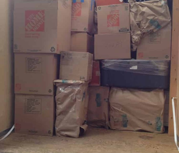 Pyramid Movers loading and stacking a POD for cross Country Move.
