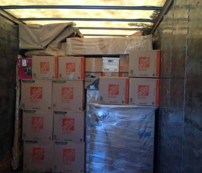 Pyramid loading and stacking a Container for cross country moving.