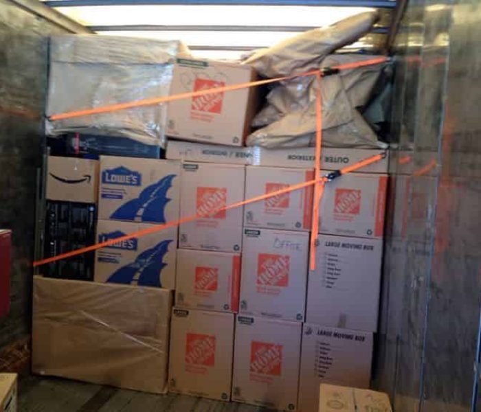 Pyramid loading and stacking a Container for cross country moving.
