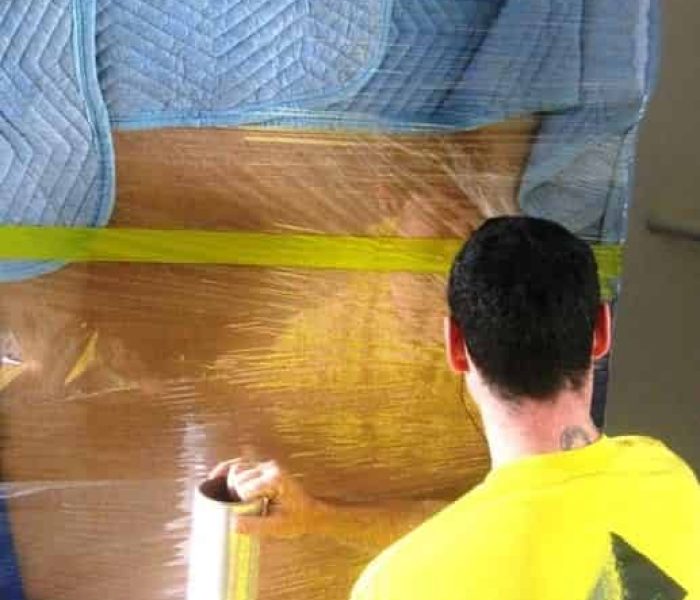 Shrink-wrapping chest of drawers