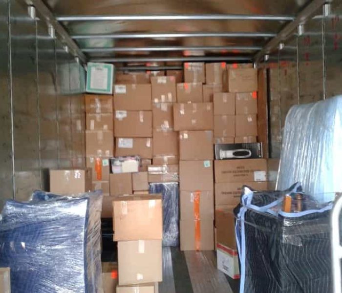 Pyramid loading and stacking a Container for cross country moving.