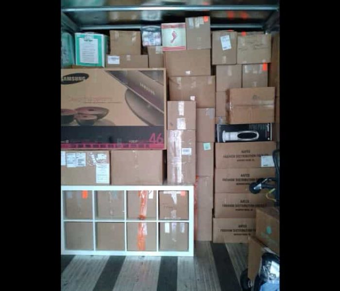 Pyramid loading and stacking a Container for cross country moving.