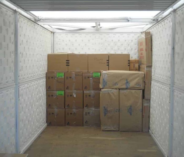 Pyramid Movers loading and stacking a POD for cross Country Move.