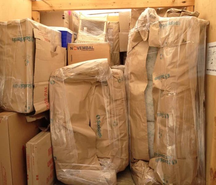 Pyramid Movers loading and stacking a POD for cross Country Move.