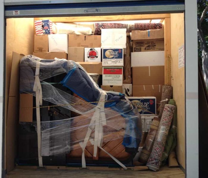 Pyramid Movers loading and stacking a POD for cross Country Move.