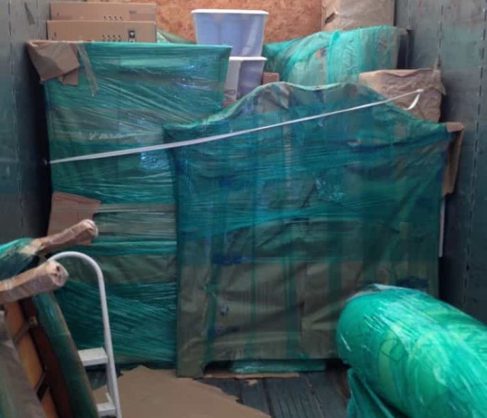 Pyramid loading and stacking a Container for cross country moving.