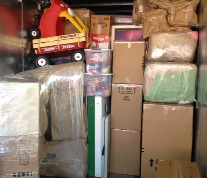 Pyramid Movers loading and stacking a trailer for cross Country Move.