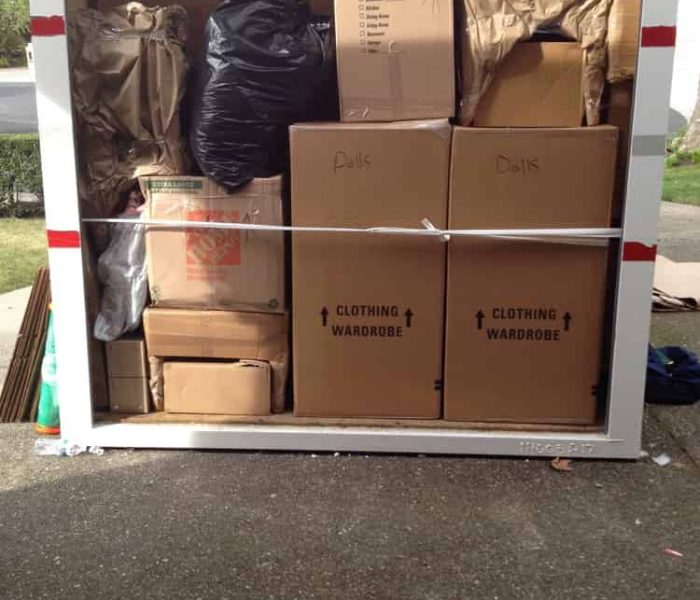 Pyramid Movers loading and stacking a POD for cross Country Move.